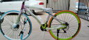 狮卡途死飞自行车成年人学生上下班代步车双碟刹减震变速越野公路赛车 30高刀-彩虹色+骑行大礼包 26寸24速直把 实拍图