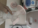 新贝 电动吸奶器带哺乳灯  锂电池 按摩吸力大挤奶器8776 实拍图