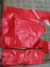 京东物流 全新家用红色塑料袋大号批发加厚专用袋拉圾袋无毒厨房 中厚24*34 红色 100个 实拍图