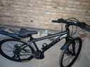 凤凰（Phoenix）山地车自行车成年人男女学生铝合金禧玛诺变速减震油碟山地自行车 深灰/钢架/辐条轮/全轴承 24速进口禧玛诺/27.5寸 实拍图