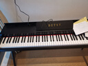 贝琪（Betsy）电钢琴重锤88键成人家用初学者专业考级家用书桌立式翻盖电子钢琴 B126力度键-木纹黑 标配(琴+学琴礼包） 实拍图