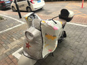 浪漫美西（langmanmeixi）电动车挡风被四季通用全包双面防水电瓶摩托车夏防风防晒罩春秋款 全包四季款【双面防水+可收纳】绿底黄帽小狗 实拍图