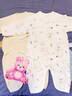 童泰婴儿衣服新生儿连体衣秋冬季夹棉保暖宝宝衣服纯棉蝴蝶哈衣2件装 黄色狮子 59cm 实拍图