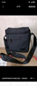 智纳新款单肩包男士包休闲商务牛津布斜挎包潮流运动轻便小背包 黑色（竖款） 实拍图