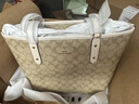 蔻驰（COACH）【官方】奥莱女士女包经典标志CITY拉链托特包老花city30 浅卡其色/粉笔白色 实拍图