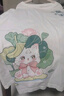 真维斯童装女童夏季套装2025新款儿童纯棉短袖T恤时尚中大童休闲花苞腰短裤 白/J荷叶猫右下-绿/J夏天K 140 实拍图