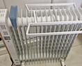 美的（Midea）【强劲热力】电热油汀/取暖器家用/加热电暖器/17片电暖气片/立式加热器大面积加湿恒温 HYW30GW 实拍图