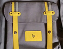 惠普（HP）双肩包旅行包男女差旅通用商务公文包大学生书包电脑背包上班通勤包笔记本电脑包时尚背包柠檬黄 实拍图