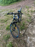 金武端自行车成人山地车公路赛车单车骑行变速超轻越野中学生初中青少年 旗舰版-辐条轮-黑蓝色 26寸21速 实拍图