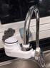 海尔（Haier）净水器水龙头过滤器家用直滤饮用水自来水滤水器前置过滤器厨房卫生间用除余氯三挡出水可清洗滤芯 月光白 一机4芯 实拍图