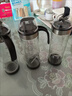 喆系自动开合玻璃防漏油瓶油壶家用酱油瓶醋壶装油罐香油小瓶厨房用品 下单送防滑圈+调料贴  300ML油壶*1 实拍图
