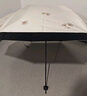 天堂 防紫外线晴雨伞三折 便携黑胶遮阳太阳伞晴雨两用 奶酪色 实拍图
