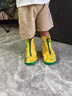 牧萌儿童雨鞋套男女童防水脚套防滑耐磨水鞋学生卡通雨靴 黄恐龙L 实拍图