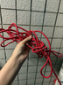 九千谷晾衣绳/打捞绳 编织尼龙绳晒衣服绳 户外强磁打捞绳 货物捆绑 称重结实拉力强 带双挂钩 红色 6mm*20米 实拍图