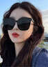 gm墨镜男女款高级感网红时尚太阳镜新款猫眼偏光遮阳防晒百搭眼镜 D款【男女通用】黑色 实拍图