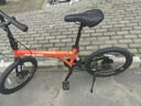 Jeep 吉普(JEEP)山地自行车男女公路车学生折叠减震城市车变速-飞虎 飞虎-20寸-辐条轮-活力橙 7速二代升级版（禧玛诺变速） 实拍图