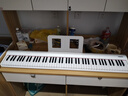 特伦斯电子琴88键成人儿童智能折叠钢琴X61A/V20手卷钢琴键盘乐器 V20时尚白+专用琴包+Z型琴架 实拍图