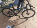 金武端自行车成人山地车公路赛车单车骑行变速超轻越野中学生初中青少年 顶配版-辐条轮-黑蓝色 27.5寸21速 实拍图
