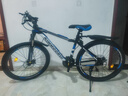 金武端自行车成人山地车公路赛车单车骑行变速超轻越野中学生初中青少年 旗舰版-辐条轮-黑蓝色 26寸21速 实拍图