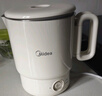 美的（Midea）第二代便携式折叠烧水杯电热水壶 旅行出差学生 泡面杯小容量迷你一体无缝内胆 0.7升 SH07S104 实拍图