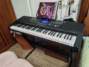美科（Meirkergr）MK-975（智能版） 亮灯跟弹61键钢琴键多功能智能电子琴乐器 连接U盘手机pad带琴架 实拍图