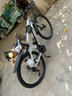 金武端自行车成人山地车公路赛车单车骑行变速超轻越野中学生初中青少年 顶配升级版-辐条轮-黑白色 26寸21速 实拍图