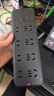 公牛（BULL）插座/插线板/插排/排插/接线板/拖线板 黑色质感 8位总控开关全长1.8米 GN-B8440H 实拍图