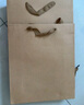 悠格码加厚牛皮纸袋手提袋 礼品袋服装茶叶送礼购物包装袋商务会议纸质袋子原色 竖款小号10个装 20*10*28cm 实拍图