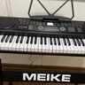 美科（Meirkergr）MK-975 61键钢琴键多功能智能电子琴儿童初学乐器 连接U盘手机pad带琴架 实拍图