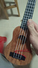 儿童玩具可弹奏尤克里里玩具仿真吉他启蒙益智乐器音乐玩具 桃木色】38厘米尤克里里-送乐谱 实拍图