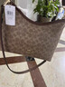 蔻驰（COACH）【品牌直供】女士LAUREL31中号手提单肩斜挎流浪包卡其棕色CV975 实拍图