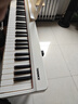 特伦斯电子琴88键成人儿童智能折叠钢琴X61A/V20手卷钢琴键盘乐器 V20时尚白+专用琴包+Z型琴架 实拍图