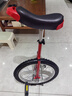 永彩独轮车儿童独轮车自行车单轮车杂技独轮车平衡车 红色18寸+打气筒+停车架+适合1.4-1.65米 实拍图
