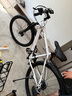凤凰（Phoenix） 上海凤凰山地自行车成人男士女式学生变速宽胎越野赛车公路单车 钢架辐条轮白【95%免安装】 26寸27速【全轴承+礼包】 实拍图