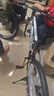 金武端自行车成人山地车公路赛车单车骑行变速超轻越野中学生初中青少年 旗舰版-辐条轮-黑白色 24寸21速 实拍图