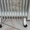 美的（Midea）【白玉】取暖器/电暖器/电暖气家用/烤火炉/13片节能速热/电热油汀/油酊/加热器/烘衣加湿HYX22N 实拍图