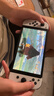 任天堂（Nintendo）【国内保税仓】Switch2/1代 OLED日版/港版游戏机续航加强版ns体感掌机便携家用主机 OLED日版白色64GB+塞尔达+奥德赛（保税仓） 实拍图