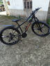 凤凰官方旗舰店山地自行车男女士变速单车青少年学生越野公路赛车途瑞 铝架【三刀/油碟刹】消光黑 26寸【适合160-185cm】 27速 实拍图
