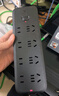 公牛（BULL）插座/插线板/插排/排插/接线板/拖线板 黑色质感 8位总控开关全长1.8米 GN-B8440H 实拍图