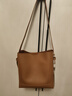 卡里普斯（CALYPSO）礼物水桶包大容量托特单肩包软牛皮女包通勤简约女士真皮斜挎大包 奶茶棕 实拍图