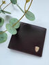 七匹狼（SEPTWOLVES）钱包男士真皮正品短款钱夹2025新款皮包头层牛皮夹爸爸卡包证件包 金盾狼标-黑色【专柜礼盒】 实拍图