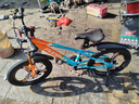 凤凰山地自行车男女变速山地车碟刹青少年儿童自行车学生单车 星际 橙蓝【单速+三刀轮】 20寸【适合125-160cm】 实拍图