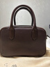 裘真【明星推荐】宽宽包植鞣牛皮休闲斜挎包手提保龄球包女 咖啡色 预售12天 实拍图