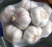大蒜头出口品质网兜紫蒜蔬菜调料新鲜大果烧烤火锅食材 【精品网兜装】6头装 180g 实拍图
