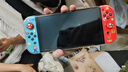 任天堂（Nintendo）【国内保税仓】Switch2/1代 OLED/续航加强日版/港版便携家用ns体感游戏机掌机 日版续航红蓝32GB保税（赠共享会员） 实拍图