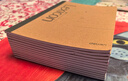 得力(deli)12本A5/40张牛皮纸无线胶装软抄本记事本 工作笔记本子文具办公用品 7636 实拍图