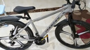 凤凰上海凤凰山地车自行车男士女式学生成人变速宽胎越野公路赛单车 【钢架/全套竞速轴承】三刀炫彩 26寸24速【建议身高158-188cm】 实拍图