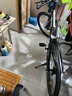 金武端自行车成人山地车公路赛车单车骑行变速超轻越野中学生初中青少年 顶配升级版-辐条轮-黑白色 26寸21速 实拍图