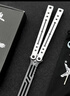 yy钢鹦鹉螺 夜光款蝴蝶刀【桔梗balisong】不锈钢内衬安全未开刃 白绿白刃 实拍图