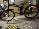 凤凰（Phoenix）折叠山地自行车男女成人学生青少年单车双减震碟刹轻便变速折叠车 黑红辐条轮/显档变速/三套全轴承 24速高配-26寸（身高160-185CM） 实拍图